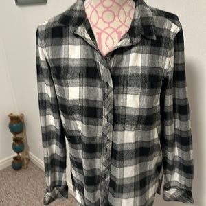 Athleta long sleeve button-down flannel shirt colors are black and white plaid
